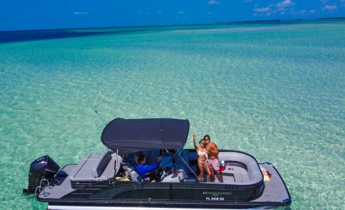 a small boat in a body of water