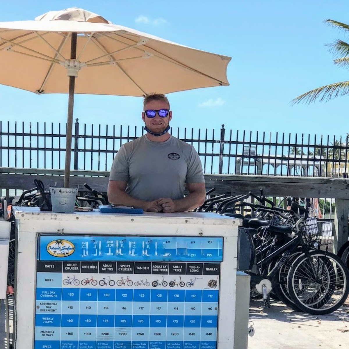 a person standing next to a bicycle